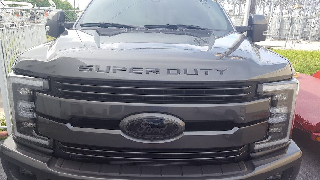Recon 264381WH Accessories - Emblem; Super Duty Letters; Hood/ Tailgate/ Interior; White; Matte; Acrylic; 3-Piece Kit